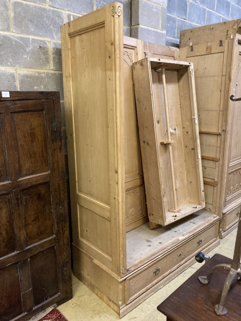 A 19th century French pine two door knockdown wardrobe with drawer and base, width 158cm depth 66cm height 234cm